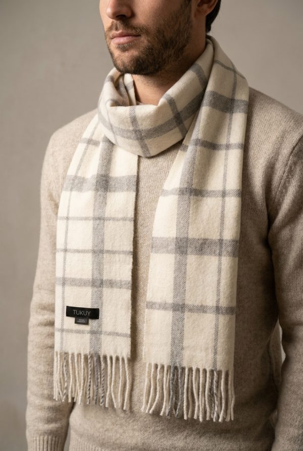 man wearing an alpaca scarf in gray and white studio photo tukuy