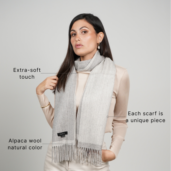 Natural gray alpaca scarf made from alpaca wool, offering softness, warmth, and a versatile reversible design.