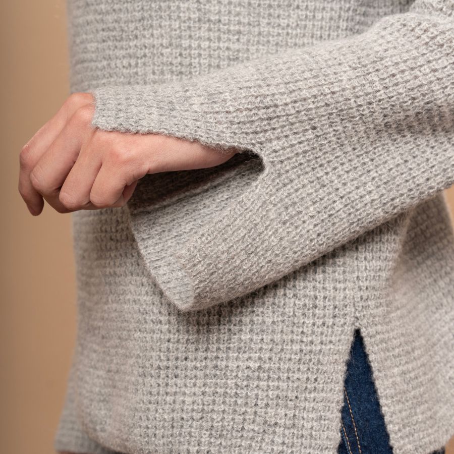women wearing alpaca sweater in gray