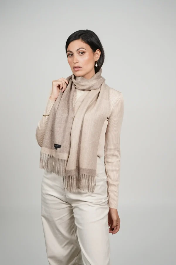women wearing a beige alpaca scarf, beige reversible scarf made with 100% baby alpaca wool by Tukuy Brand