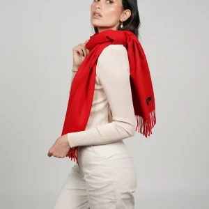alpaca scarf in intense red. Women wearing a luxurious red scarf designed by tukuy brand.