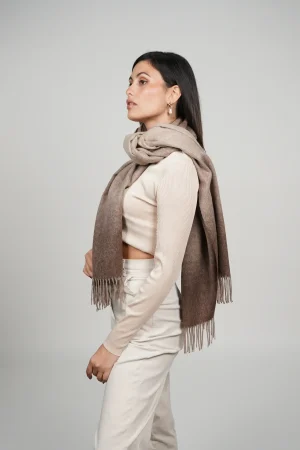 women wearing a brown big alpaca scarf in natural color of alpaca wool. luxurious touch and nice drape by tukuy brand