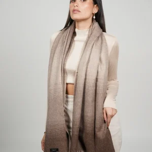 women wearing a brown alpaca shawl in natural color of alpaca wool. luxurious touch and nice drape by tukuy brand