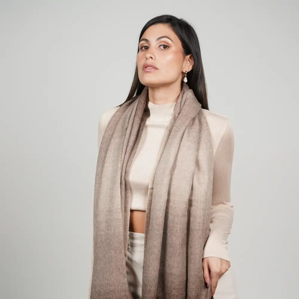 Baby alpaca shawl in brown ombre worn with a cream sweater
