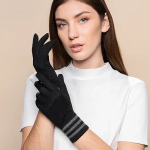 Model wearing black knit alpaca gloves and a white short-sleeve top