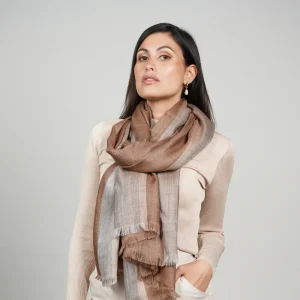 Baby alpaca and silk shawl in brown and grey wrapped around the neck