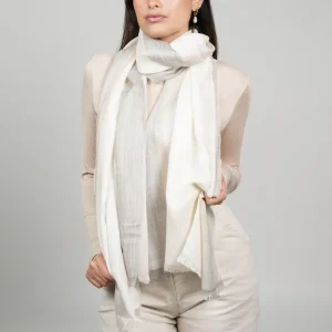 Baby alpaca and silk shawl in grey and white wrapped around the neck