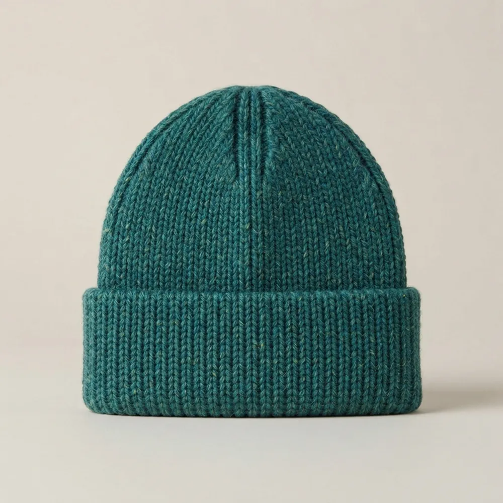 Teal ribbed knit alpaca beanie with a folded cuff