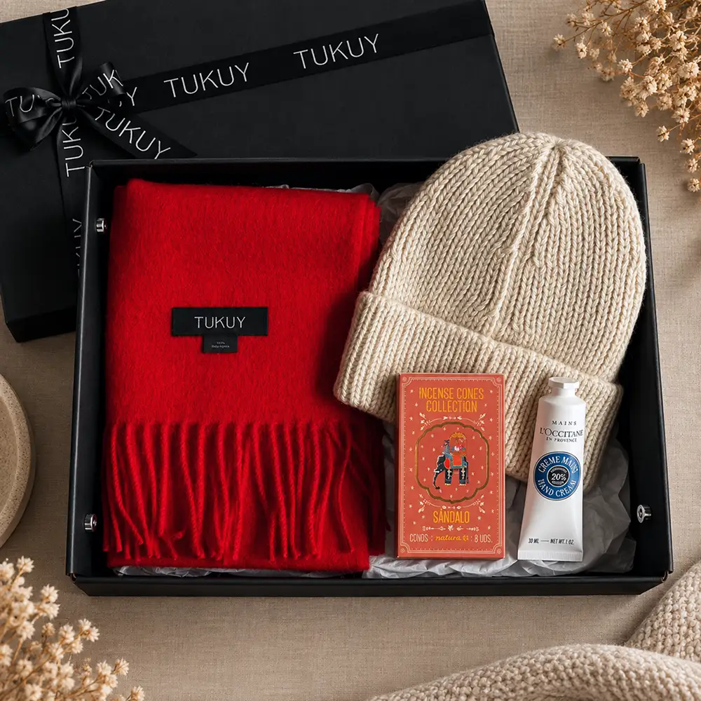 alpaca gift box with alpaca scarf in red, alpaca beanie, hand cream and candles